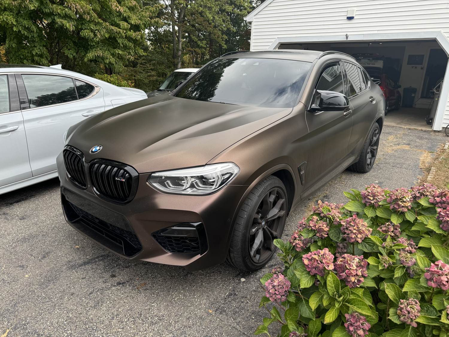 Matte bronze vinyl wrap on BMW X4M