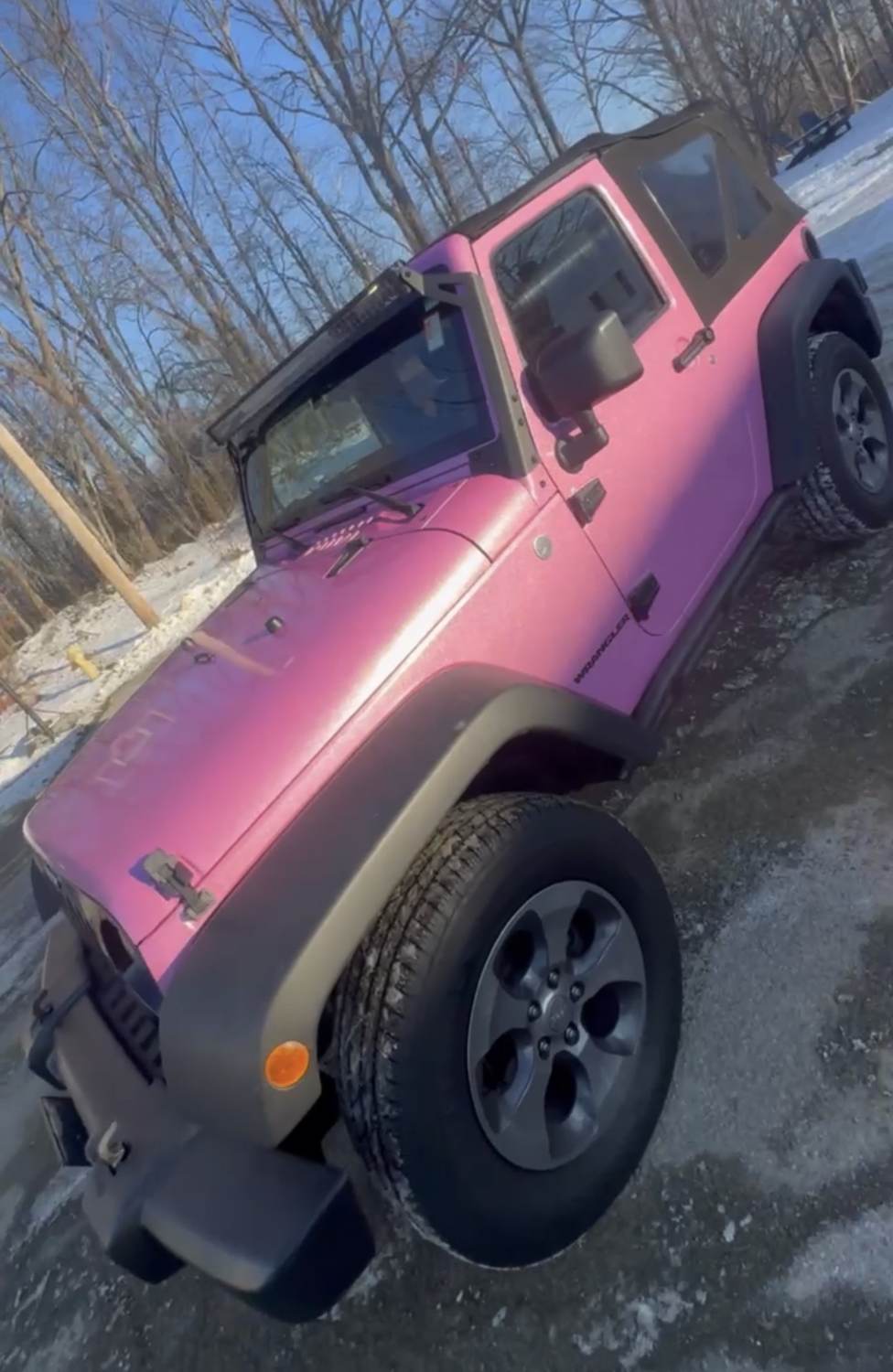 Matte pink vinyl wrap on Jeep Wrangler