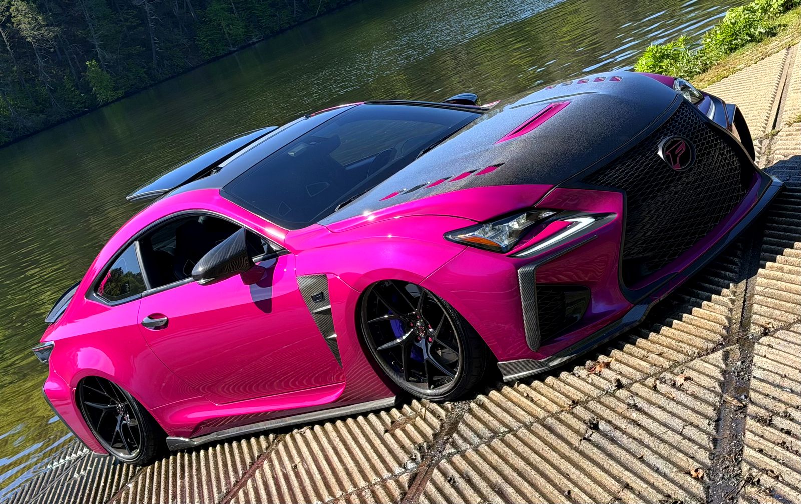 Pink and black widebody vinyl wrap on Lexus RCF by TMWraps LLC